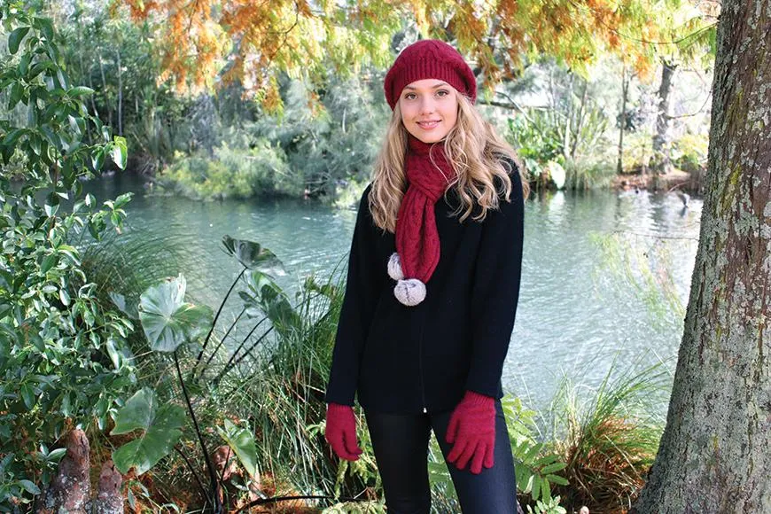 CABLE SCARF WITH RABBIT FUR POMPOMS